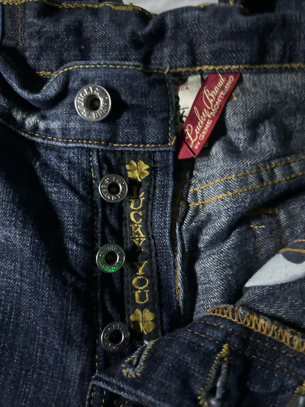 Lucky Brand Dark blue wash with contrasting gold stitching low rise jeans